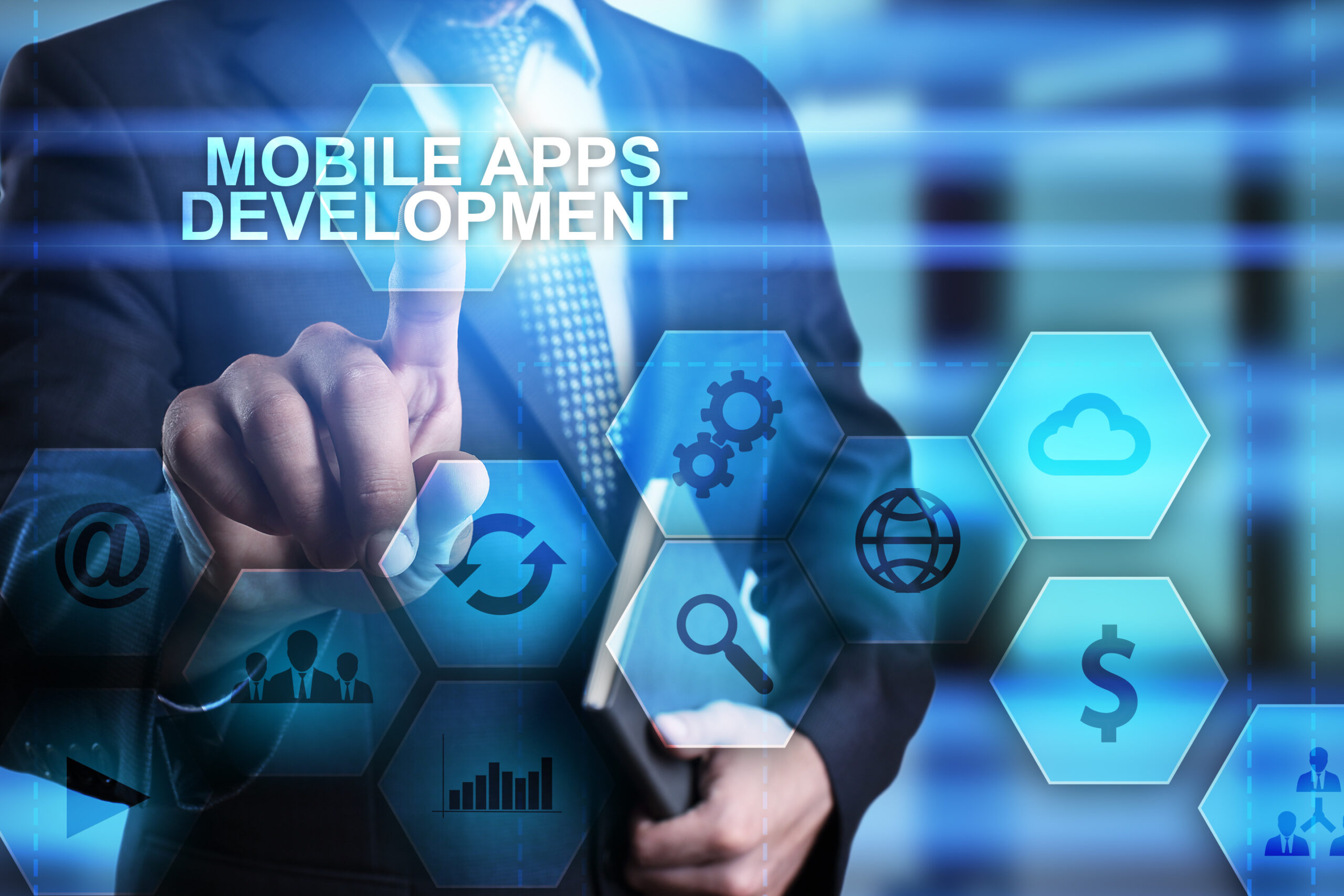 Businessman pressing button on touch screen interface and select mobile apps development.